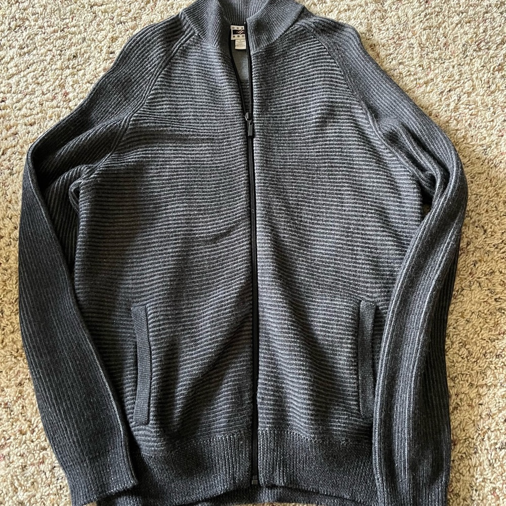 Zip up cardigan.